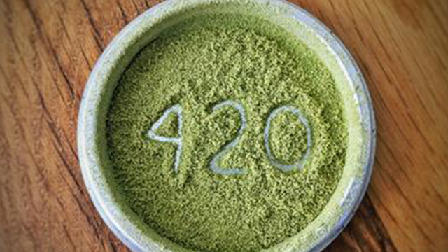 numbers 420 written in kief in a bowl