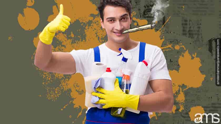 guy with hands full of cleaning equipment