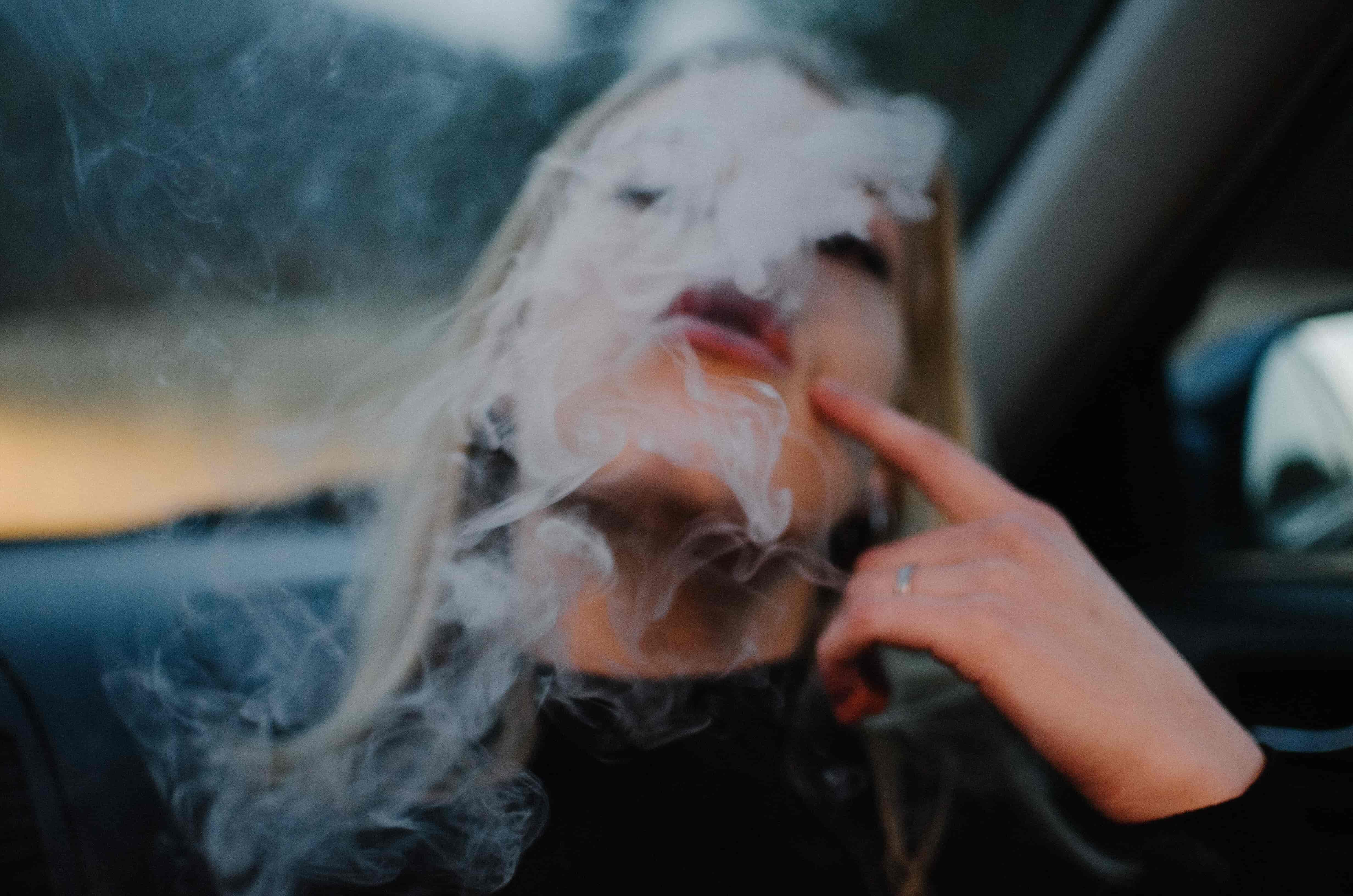 Woman smoking bubble hash