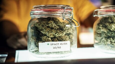 jar loaded with weed buds