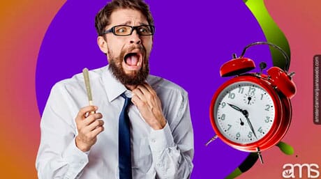 man screaming with a joint in his hand at an alarm clock