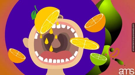 open mouth with citrus fruits around it